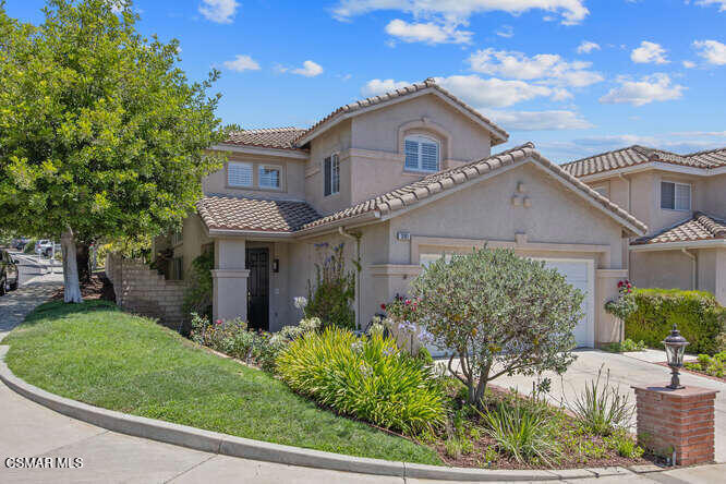 Welcome to this beautifully maintained 4-bedroom, 3-bathroom two-story home located on a quiet corner lot at the end of a cul-de-sac in the prestigious gated Eagle Ridge community of Thousand Oaks. Enjoy resort-style amenities including a sparkling community pool, clubhouse, and dedicated play area.Inside, you'll find a bright, open layout with fresh interior paint and elegant marble flooring throughout the main level. The inviting family room with a cozy fireplace opens to a formal dining area with a modern chandelier and a spacious living room with soaring floor-to-ceiling windows that flood the space with natural light.The kitchen features an oven, gas range, microwave, and new stainless steel refrigerator and dishwasher, plus a sunny breakfast nook that opens to a charming backyard patio--ideal for relaxing or entertaining.A downstairs bedroom and full bath offer flexibility for guests or a home office. You'll also find a convenient indoor laundry room on the first floor.Upstairs, new luxury wood-style flooring runs throughout. The spacious primary suite includes a large walk-in closet and en-suite bath with dual vanities, a soaking tub, and separate shower. Two additional bedrooms enjoy the convenience of a Jack and Jill bathroom . Close to parks,, top-rated Schools, trails, and shopping,Don't miss your chance to live in one of Thousand Oaks' most desirable gated communities!