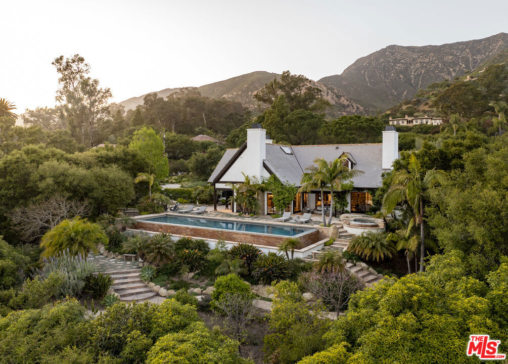 Located in a beloved Montecito location with vast ocean views and a fabulous floor plan, this newly remodeled home is everything you've been waiting for! The design/build firm of Becker Studios reimagined the residence in 2015 resulting in a home that embodies the style and ease for which Montecito is known. Steel doors and windows pair beautifully with wide plank oak floors. Public spaces flow effortlessly with expansive terraces and celebrate an indoor/outdoor lifestyle. The main level primary has a dream en suite bathroom and spacious closet. Two more bedroom suites on the main level plus two more upstairs make this layout idea for all seasons of life. Multiple garden districts are scattered throughout the property and are aided by a private well. Beautiful spaces abound inside and out