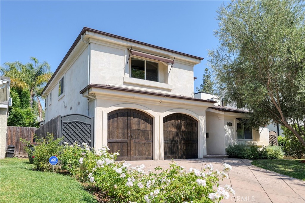 Welcome to this spectacular Studio City property with the charm of a Mediterranean villa combined with upscale and modern amenities. This immaculate home showcases designer touches throughout. A gorgeous kitchen which is appointed with high-end, stainless steel appliances, granite countertops, and a large island. A large Family Room invites you outside to experience the resort-style backyard. The rear yard features a pool, outdoor BBQ, fire pit and formal bar area. You'll be sure to enjoy the outdoor lifestyle of Southern California year round! Walk to fantastic shops and restaurants. This prime Studio City location is living at it's finest!