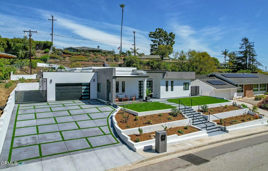 Welcome to this stunning, New-Build single-story Ventura Hillside home, a modern masterpiece offering luxury and comfort. The expansive great room features soaring high ceilings, creating a bright and airy atmosphere that seamlessly flows into the chef's kitchen. With an open floor plan perfect for entertaining, the kitchen boasts stainless steel appliances, a walk-in pantry, an oversized island and a large window with amazing backyard views. Step outside to a large covered patio, ideal for dining and relaxation, surrounded by a tranquil backyard with additional patios and multiple planters, creating a peaceful retreat. Owned solar panels recently installed to keep energy costs low! This home offers five spacious bedrooms, all of which are en suite, providing ultimate privacy and convenience. Enjoy breathtaking views of the city lights, surrounding mountains, and a peekaboo ocean view. Located in a serene neighborhood, this property is the perfect blend of modern design and natural beauty. Schedule your showing today and experience all this exceptional home has to offer.