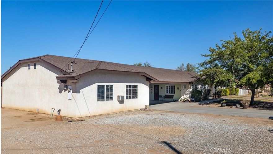 Spacious Ranch-Style Home on 2 Acres Zoned for Horses, ADU Potential & More!



Nestled in a highly desirable neighborhood with unbeatable convenience, this expansive ranch-style home sits on a generous 2.0-acre lot offering privacy, versatility, and room to grow. Whether you're dreaming of a hobby farm, RV setup, or simply space to spread out, this property delivers.

Equestrian-Friendly, already configured with four corrals, it's ready for your animals. Ample Parking & Storage enjoy RV parking, a central carport, and an attached two-car garage with a separate entrance. A covered patio provides the perfect space to gather with family and friends, thoughtfully fenced for added privacy. The entire property is fully fenced for peace of mind.Warm & Inviting Interior, the kitchen features abundant cabinetry and a center island, seamlessly flowing into the dining area and spacious family room with a cozy fireplace. Bonus Detached Room, a separate room with its own entrance offers potential as an ADU, home office, or guest suite. With ample space for customization and expansion, this property invites you to bring your vision and make it your own. Whether you're looking for a peaceful retreat or a multi-functional homestead, this home checks all the boxes.