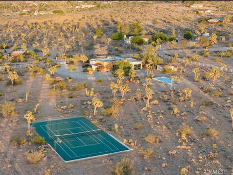 Photo of 3484 El Dorado Road, Yucca Valley, CA 92284 (MLS # JT26187577)