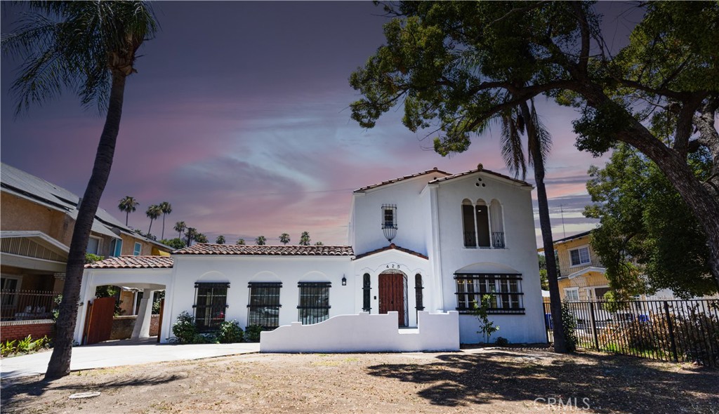 Discover timeless elegance and modern living in this beautifully remodeled two-story Colonial Spanish-style home, nestled in one of San Bernardino’s most desirable neighborhoods. With its signature tile roof and classic architecture, this 2,200 sq ft gem sits on an expansive 12,000 sq ft lot — offering plenty of room to relax, entertain, or even build the pool of your dreams.
Step inside to find a fresh, stylish interior featuring brand-new flooring, energy-efficient dual-pane windows, and crisp new paint inside and out. The fully upgraded kitchen is a showstopper — boasting elegant cabinetry, gorgeous countertops, and a layout that’s perfect for both everyday living and hosting.
What truly sets this property apart is its incredible versatility. In addition to the main residence, you'll find a spacious 2-bedroom Accessory Dwelling Unit (ADU) — perfect for guests, extended family, or extra rental income. Plus, there's a Junior ADU, ideal as a private office, art studio, or yet another rental opportunity.
The large gated lot ensures privacy and security, while the oversized front driveway offers ample parking. Need room for business vehicles, work trucks, or an RV? The convenient alley access and additional rear parking make this property ideal for contractors, entrepreneurs, or anyone needing extra space.
Classic charm, modern upgrades, and outstanding income potential — all in one unbeatable San Bernardino location. Don’t miss this rare opportunity!
