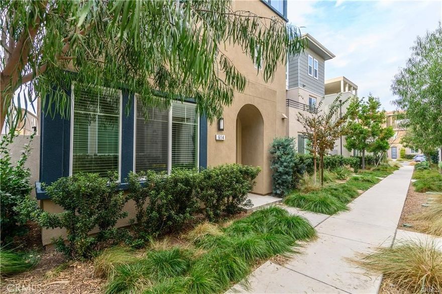 A gorgeous home at the Cadence Park of the Great Park.  3 private parking spots and a backyard and next to a greenbelt, easy to take a short stroll in the evening. Walk to park, swimming pool, club house, and Cadence Park school. First floor features a light and bright chef's dream kitchen and spacious living room with laminate flooring, attached 2 car garage and one additional carport, the sliding door at the living room opens up to a private yard. A well appointed master bedroom on the second floor with a shower and a huge walk in closet, 2 other guest rooms sharing one full bath on the second floor. There is a loft and a huge balcony on the third floor.  Home is in excellent condition, and fridge is included; and landlord will not supply washer and dryer. Close to Woodbury shopping center, Spectrum shopping center, and south Coast Shopping Plaza,  easy access to highway I-5, I-133, and major high way. A lot of Amenities provided by Cadence Park and Great Park, including swimming pool, jacuzzi, and BBQ, sport parks, tot lot, and many more. Highly rated Irvine Public Schools, walk to toped rated Cadence Park elementary and middle school. Close to famous Portola High School. Home comes with Electric car charger as well.
