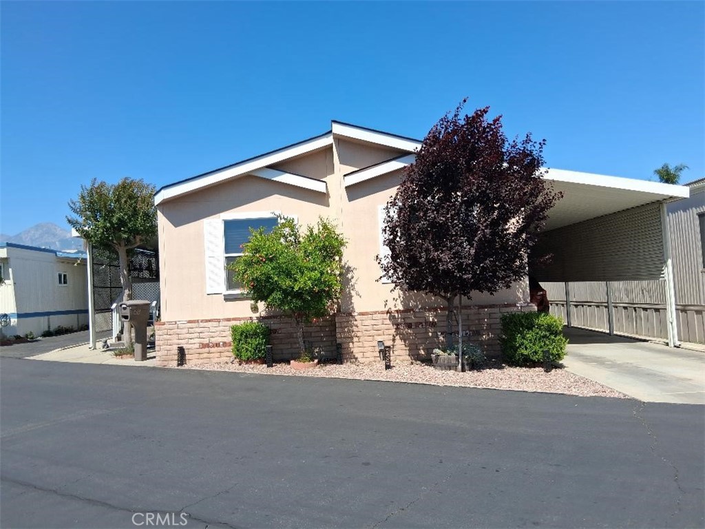 PERFECT PERFECT BEAUTIFUL TURN KEY HOME IN UPLAND VIEW TERRACE MOBILEHOME PARK. The home built in 2012 with 3 bedrooms and 2 baths. Wide spacious of 1320 sqft. Central AC and Heating. Recess Lighting, Remodel kitchen with storage pantry room. Model hard wood floor thru out the home. convenient Laundry room is inside. Comfortable cozy at Patio and Private enclosure of back yard. Affordable less fee for space rent of $687 per month covered pool and spa , Clubhouse, car-washer area, guest parking, street cleaning, Community Laundry Room and more. DON'T MISS THIS OUT.