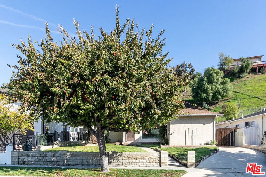 Welcome to this charming 3-bedroom, 2-bath home offering 1,519 sq ft of comfortable living in a highly desirable Sun Valley neighborhood. This inviting residence features a spacious and open common area perfect for everyday living and entertaining. The family room includes a cozy fireplace, and the well-appointed kitchen comes with modern updates, ample storage, and a built-in wine fridge. The home offers three well-sized bedrooms, two clean and functional bathrooms, and great natural light throughout. Outside, you'll find a detached 2-car garage and a private yard with room to relax, garden, or create your ideal outdoor space. Conveniently located near local amenities, parks, shopping, dining, and commuter routes, this property combines comfort, convenience, and neighborhood appeal.