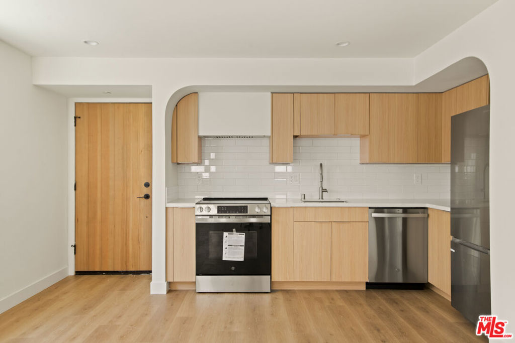 ** PET FRIENDLY ** WASHER/DRYER ** CENTRAL A/C ** MODERN CONSTRUCTION ** HIGH CEILINGS ** Welcome to your stylish hillside escape in the heart of Silver Lake! This stunning pet-friendly upper-level 2-bedroom, 1-bath home offers 800 sq ft of sun-drenched living space designed with comfort and sophistication in mind. Step inside to discover an open-concept layout with oversized windows, sleek flooring, and thoughtful designer finishes that create a perfect blend of warmth and modern appeal. The updated kitchen comes fully equipped with an electric range, refrigerator, dishwasher, washer, and dryer, everything you need for easy everyday living. Both bedrooms are generously sized with beautiful natural light, while the bathrooms boast contemporary tile work and chic fixtures. Located on a quiet, charming street, yet just minutes from the best of Silver Lake, Echo Park, and Atwater Village, you'll have easy access to iconic coffee shops, hip eateries, trendy boutiques, and the Silver Lake Reservoir for weekend walks. Enjoy the perfect balance of city energy and neighborhood. This pet-friendly gem is modern Los Angeles living at its best, waiting for you at 2669 Benedict Street. Pictures may be a mix of similar units.