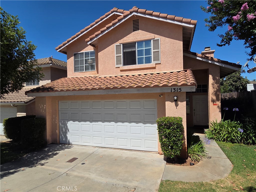 Welcome to 1315 Navello Terrace in El Cajon, a two-story home offering 1,410 sq ft of living space with 3 bedrooms and 2.5 baths on a low-maintenance yard. Vaulted ceilings and large windows fill the formal living and dining rooms with natural light, flowing into a spacious family room. Upstairs, the primary suite boasts a walk-in closet and private bath, while two additional bedrooms share a hall bath with tub and shower combo. The generous kitchen provides plenty of room for an island or eat-in nook, and the compact backyard is perfect for al fresco dining and easy landscaping. A low HOA fee covers front-yard maintenance, freeing you to relax and enjoy! Seller is willing to offer flooring credit at the right price, and all financing types are welcome. Convenient to shopping, dining, parks and major freeways, this home is a rare opportunity to customize in a prime El Cajon neighborhood—schedule your showing today!
