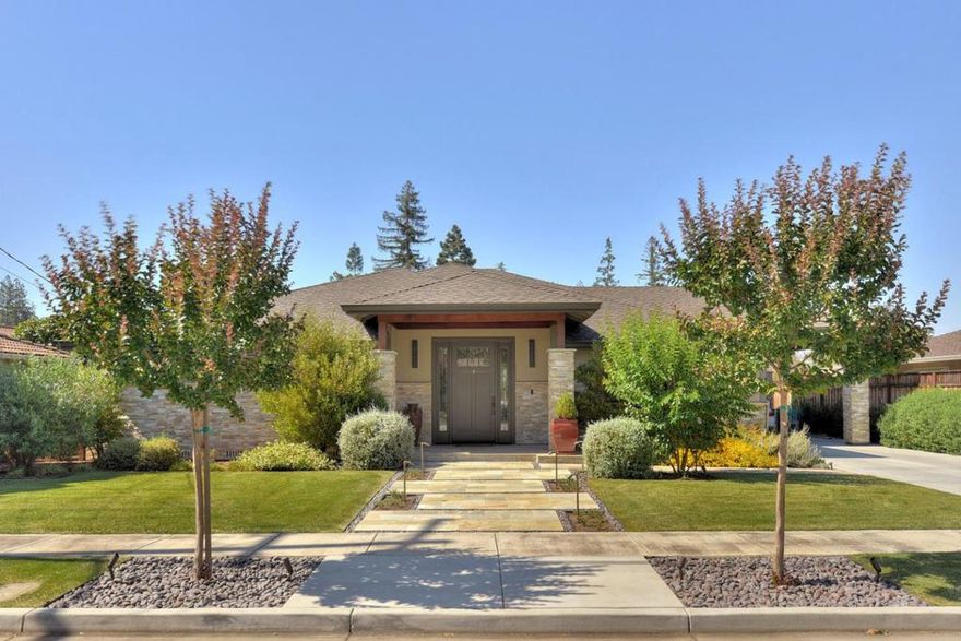 Open Sat/SUN 1-4. Contemporary, chic & modern residence, this custom re-built masterpiece is defined by its clean, architectural lines and a seamless, open-concept floor plan. Soaring ceilings, rich, wide-plank floors draw you into the spectacular great room where all public spaces flow seamlessly. Every detail in this urban beauty has been curated with high-quality finishes and exceptional craftsmanship. Incredible ambiance is palpable at every turn, nowhere more so than the chef's kitchen: a stunning culinary work of art w/leathered granite, w/backlit onyx accents, custom cabinetry, sleek, top-of-the-line appliances the perfect blend of high-performance function and dazzling design. 4 bedrooms, each with an abundance of space. Primary suite offers built-ins, dual walk-in closets w/custom organizers and access to the private yard. 8doors open to the backyard oasis w/a stone paver patio, serene covered porch, and a built-in fire pit offering the ultimate indoor/outdoor living experience. Private drive w/porte cochÃ¨re, an oversized 2 car garage w/built-ins. Other features: Custom mudroom and to die for pantry; exotic wood paneled walls, backlit built-ins/Solar/high-performance/ energy-efficient/heated floors & more! This stylish sanctuary but a smart investment for years to come.