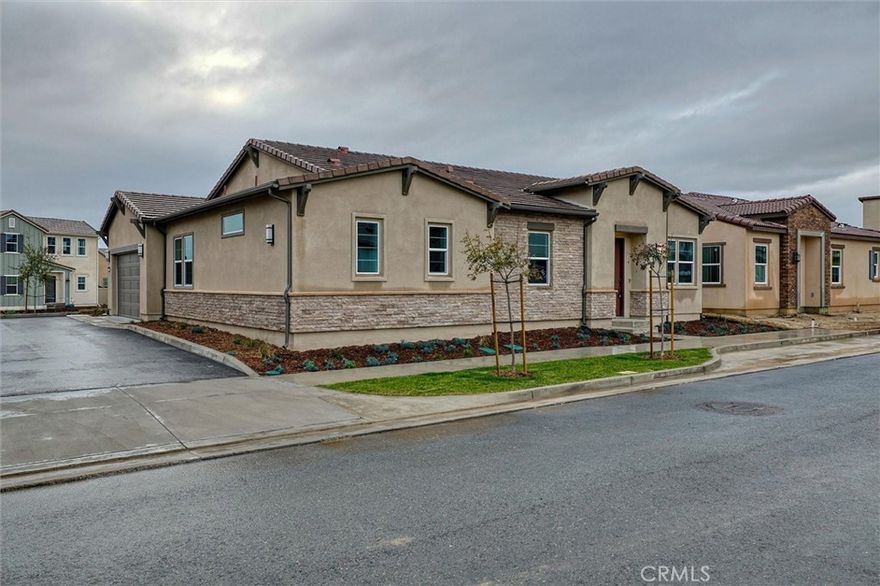 Brand New over 55+ -  never lived in single story townhouse with no common walls. Very Private.  Attached two car garage with direct access.  No homes behind with beautiful peaceful open area. Patio/backyard is in the process of being landscaped.  Gorgeous great room with fabulous kitchen that has a huge center island.  All appliances included.  This is a very special home ready to move into.  Primary suite is extra large and has a gorgeous double vanity with a huge walk in closet.  Secondary bedroom is extra large with its own bath.  Solar included so you don't have an electric bill!.  Large covered patio with view to the open area.  Very private. The amenities are like living in a resort.  Clubhouse, pool, pickleball, park and pitch and putt play area.  some of the pictures are virtual staged.  Don't miss seeing this!  Ready to move into.