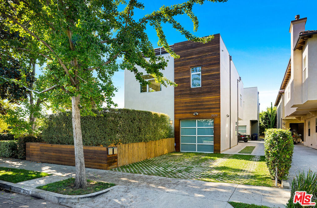 Wonderful, modern home with an open spacious floor plan and private gated parking on a desirable tree-lined street. Very rare private rear unit on a two-unit lot just 3 blocks from Sawtelle Boulevard restaurants and shopping. The first floor is open and perfect for entertaining with double doors leading to the private backyard and patio. 3 bedrooms and 2.5 bathrooms with plenty of storage space, master bedroom has a great walk-in closet with built-in drawers and shelves. Large roof deck with views of the Getty and Century City. Trader Joe's and a 24-hour Ralph are in close proximity.