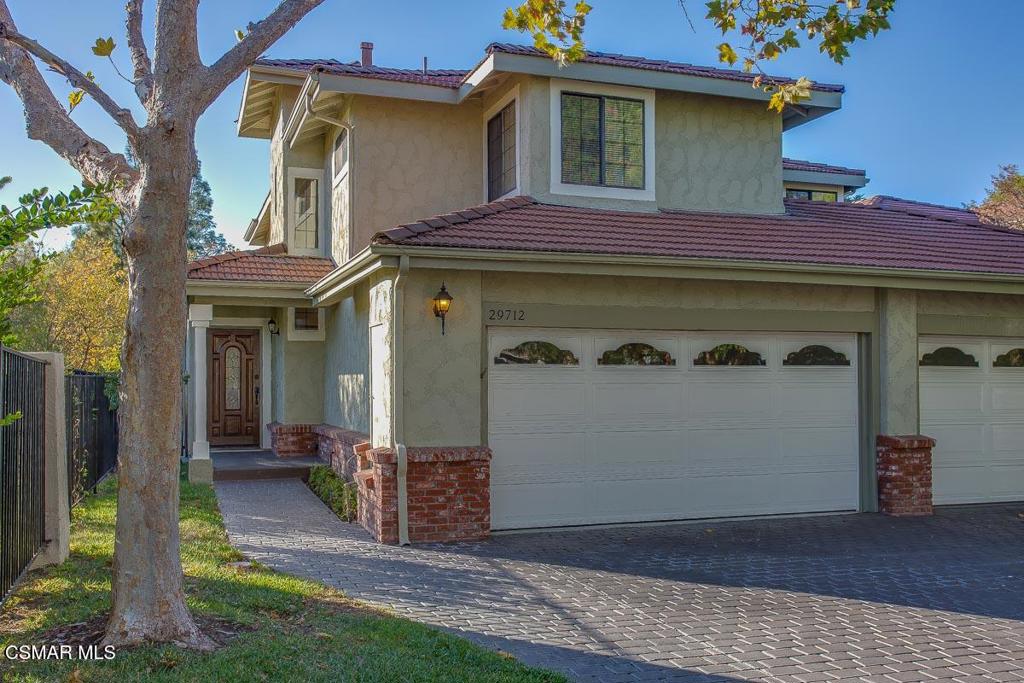 This beautiful 3 bedroom, 3 bath home is located in the heart of Agoura Hills with easy access to restaurants, shops and the 101 freeway. It includes a new kitchen, paint and carpet throughout. The master suite features dual walk in closets, large sitting area with panoramic views overlooking the Santa Monica Mountains. The second master suite upstairs also has great views of the mountains. The downstairs bedroom and full bathroom has access to an interior atrium, while an upstairs laundry room includes washer and hookups for a dryer. The attached two car garage has direct access to the home. This property is an end unit on a quiet cul-de-sac and features mountain views, high ceilings, a floor to ceiling fireplace, and lots of natural light, which flows to a wrap-around outdoor patio that is perfect for entertaining. The location is a short drive to Malibu beaches, and The Valley, while also in the award winning Las Virgenes School District. Access to tennis court, pool, and spa are included. NO PETS, GOOD CREDIT a MUST