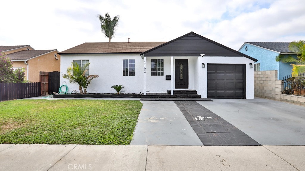 Single family home in the heart of Norwalk featuring 4 bedrooms and 2 bathrooms. Updated kitchen and bathrooms, large backyard perfect for summer bbqs and all entertaining. Large open kitchen with spacious dinning area. Perfect for a first time home or a growing family. Subject to lender approval