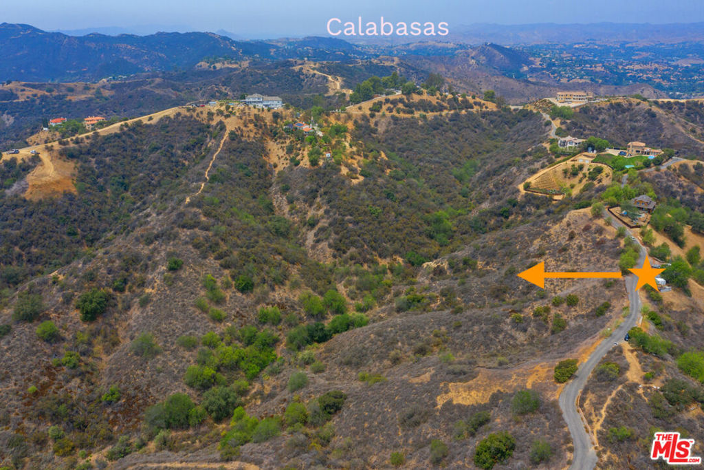 Amazing opportunity in a peaceful and scenic Topanga hillside setting, surrounded by breathtaking views. This expansive 10 acre property offers dual access from both Calabasas and Topanga Canyon, on a private and gated road. This stunning, natural retreat is located outside of the Coastal Commission jurisdiction. The seller has engaged an architect and permit expert, and is actively working on obtaining a building permit. The neighboring lot is also for sale, presenting the opportunity to own a combined 20 acres of land. This rare offering allows you to experience nature and your own solace away from the city hustle and bustle. If it's outdoor activities you're looking to embrace, look no further than nearby state park's for hiking, horseback riding, picnicking, camping, and rock climbing. A short drive takes you through 27 miles of scenic beauty, leading to world-class beaches for surf and sand. Seldom do you find a natural setting as idyllic and beautiful as this, yet just a short distance to the charming village with boutiques, restaurants, farmers market, and music & lifestyle festivals. Easy access to nearby beaches, Calabasas and Woodland Hills, as well as a short drive to Erewhon, Whole Foods, Bluebottle Coffee, Bristol Farms, and Gelson's. Neighboring properties on Luse Tank Road (extension of Corsham Rd), where you will find homes in the $2 - $4m range.