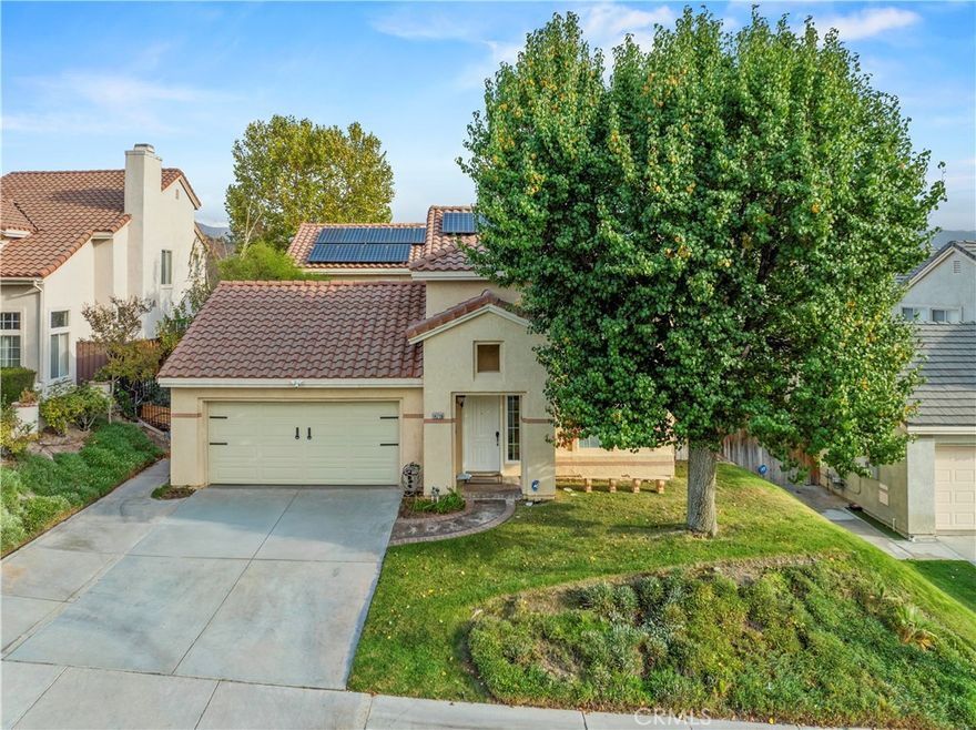 Experience one of the most breathtaking VIEWS in all of Santa Clarita from this Canyon Country stunner! Perfectly perched to capture sweeping city and mountain vistas, this home is as much about the lifestyle as it is about the property. Step inside & find 4 bedrooms, one of which is currently a library/office space that had the door removed but could easily be converted back, 3 full bathrooms, cherry wood cabinets, striking copper countertops, and a charming Mediterranean courtyard that creates a private retreat and ideal spot for entertaining and gardening. Entertain with ease thanks to a spacious butler’s pantry, while the newer HVAC and water heater keep everything running efficiently. Owned solar helps keep energy bills very low. Outside, enjoy your very own backyard oasis with a sparkling pool and spa — ideal for long summer days and cozy evenings under the stars. Located just a 1/2 mile from the 14 freeway, commuting is easy, yet the neighborhood feels worlds away with its reputation for safety, family-friendly atmosphere, and exceptionally low crime levels. If you’ve been dreaming of moving to Santa Clarita, this is the property you’ll want to call home.