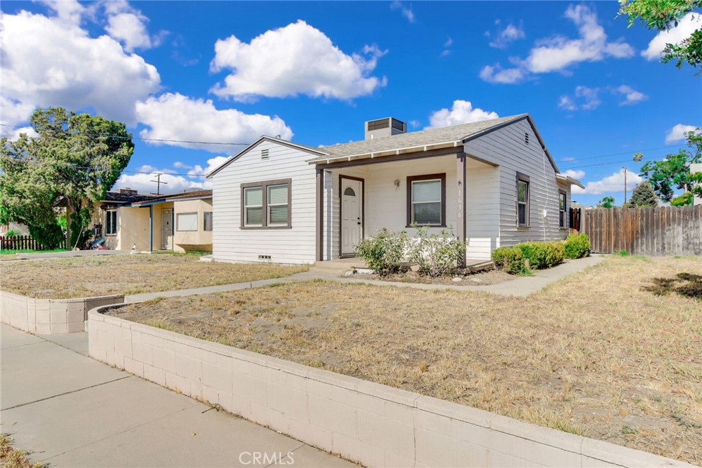 This Super Cute Redlands Bungalow has tons of potential! This 2 bedroom 1 bath home would be a great starter home or a lucrative investment property, it is oversized and spacious for a two bedroom home on a pool sized lot. The two bedrooms are very large and could almost be used as double master bedrooms. There is a front entry living room, with a separate dedicated dining room in between the front living room and the kitchen at the back of the house. The kitchen has tile countertops and gas connection for the stove. Behind the kitchen is a huge utility room where the washer and dryer is located you could use the room as a pantry or you could possibly add a second fridge or freezer. The middle full bathroom has a combo tub and shower area with a surround tile enclosure. The bedrooms have ceiling fans in addition to the CENTRAL AIR AND HEAT SYSTEM that is hard to find in older homes. The house has a fully fenced backyard with a storage shed for all your lawn equipment and a little cellar for storage, plus there is a cement deck patio and the patio furniture is also included. The location of the home is prime an is very close to easy freeway access to both the 10 and 210 freeways. It is walking distance to Citrus Valley High School and also has fast and easy access to shopping and dining options at Citrus Plaza as well as the wonderfully charming South Downtown Redlands entertainment area. No HOA and Low Taxes