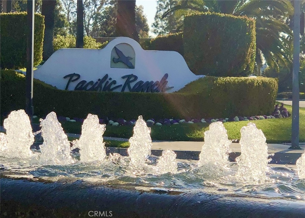 Welcome to this B-E-A-U-T-I-F-U-L, seaside abode! A highly desirable ONE-LEVEL, GROUND FLOOR, END-UNIT condo located in a very private alcove in the exclusive and well-maintained GUARD-GATED community of Pacific Ranch in Huntington Beach. This is your opportunity to live your best life everyday just like a resort vacation destination. Enjoy the 3 HOA Pools/3 Spas/Clubhouses/greenbelts/running streams/book library-exchange/friendly neighbors… This charming, low-maintenance beach home is less than 2 miles from the iconic HB Pier and Downtown! Whether you Walk/Bike/Drive/Uber, you are bound to ENJOY the BEST of HB restaurants, entertainment, shopping, renowned resort hotel spas, and endless sights of ocean waves, sandy beaches & sunshine… all in your own “backyard”! Plenty of amazing parks and great schools nearby as well. SPECIFIC UPGRADES AND FEATURES OF THIS HOME INCLUDE: Recently installed recessed lighting throughout the generously-sized Living Area & Primary Bedroom; New Ceiling Fans in Dining Area and Primary Bedroom; Freshly Painted Interior with Accent Walls; Newer Luxury Vinyl Plank Flooring throughout; Newer Windows and Sliding Glass Doors throughout; En-Suite Primary with Tiled Walk-In Shower, Dual Sinks, Walk-in Closet with Closet System; Mirror Closet Doors in 2nd BR; Mantle & Fireplace in Living Rm with Gas Starter; NEW Window Blinds and Custom Curtain; Inside Laundry; 2 Private Covered Patios with Newer Exterior Lighting Fixtures; Private Exterior Storage Closet; Sleek Kitchen Countertops & Stainless Steel Appliances, including a BRAND NEW dishwasher. Gas Cooking Range, Refrigerator, and Washer/Dryer unit are also included in the sale. This unit features a Detached 1-CAR Garage PLUS 1 Designated Carport Space and nearby Guest Parking. The Garage has both ample Built-In Storage & Freestanding Storage Shelves that are included.