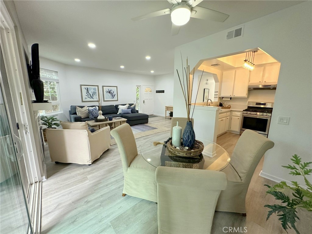 Welcome to this B-E-A-U-T-I-F-U-L, seaside abode! A highly desirable ONE-LEVEL, GROUND FLOOR, END-UNIT condo located in a very private alcove in the exclusive and well-maintained GUARD-GATED community of Pacific Ranch in Huntington Beach. This is your opportunity to live your best life everyday just like a resort vacation destination. Enjoy the 3 HOA Pools/3 Spas/Clubhouses/greenbelts/running streams/book library-exchange/friendly neighbors… This charming, low-maintenance beach home is less than 2 miles from the iconic HB Pier and Downtown! Whether you Walk/Bike/Drive/Uber, you are bound to ENJOY the BEST of HB restaurants, entertainment, shopping, renowned resort hotel spas, and endless sights of ocean waves, sandy beaches & sunshine… all in your own “backyard”! Plenty of amazing parks and great schools nearby as well. SPECIFIC UPGRADES AND FEATURES OF THIS HOME INCLUDE: Recently installed recessed lighting throughout the generously-sized Living Area & Primary Bedroom; New Ceiling Fans in Dining Area and Primary Bedroom; Freshly Painted Interior with Accent Walls; Newer Luxury Vinyl Plank Flooring throughout; Newer Windows and Sliding Glass Doors throughout; En-Suite Primary with Tiled Walk-In Shower, Dual Sinks, Walk-in Closet with Closet System; Mirror Closet Doors in 2nd BR; Mantle & Fireplace in Living Rm with Gas Starter; NEW Window Blinds and Custom Curtain; Inside Laundry; 2 Private Covered Patios with Newer Exterior Lighting Fixtures; Private Exterior Storage Closet; Sleek Kitchen Countertops & Stainless Steel Appliances, including a BRAND NEW dishwasher. Gas Cooking Range, Refrigerator, and Washer/Dryer unit are also included in the sale. This unit features a Detached 1-CAR Garage PLUS 1 Designated Carport Space and nearby Guest Parking. The Garage has both ample Built-In Storage & Freestanding Storage Shelves that are included.