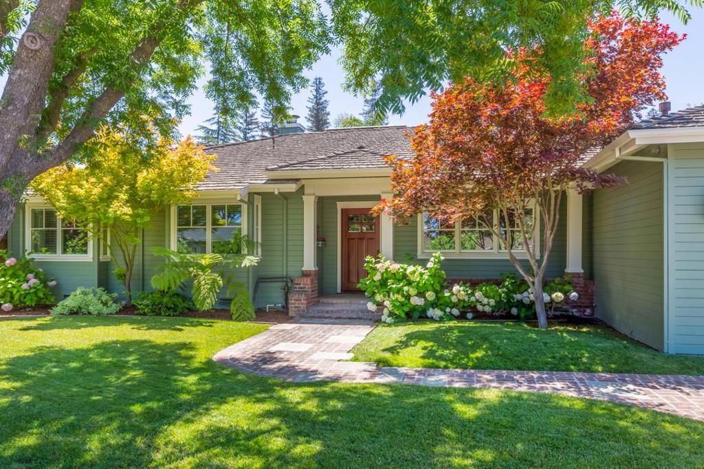 Located at the end of a cul-de-sac in prime North Los Altos, this home was completely rebuilt in 2007 and features high-end appointments, an ideal single-level floor plan, and a lush garden setting. The front yard stuns with 4 mature Japanese maples, a lovely shade tree, and a welcoming front porch. Inside, the public rooms flow from one to the next in the center of the home, ideal for family living and entertaining. Craft wonderful meals in the marble-appointed chefs kitchen with a spacious casual dining room, and host guests in the living/dining room overlooking the garden. On one side of the home, a guest room has views of the backyard, and a quiet office offers a built-in workstation. On the other side, a private bedroom wing includes two well-sized bedrooms and the primary suite complete with a large walk-in closet and ensuite bath. The backyard features vast brick patios, walking paths, a pergola-covered patio, lush plantings, productive fruit trees, and a gardening area.