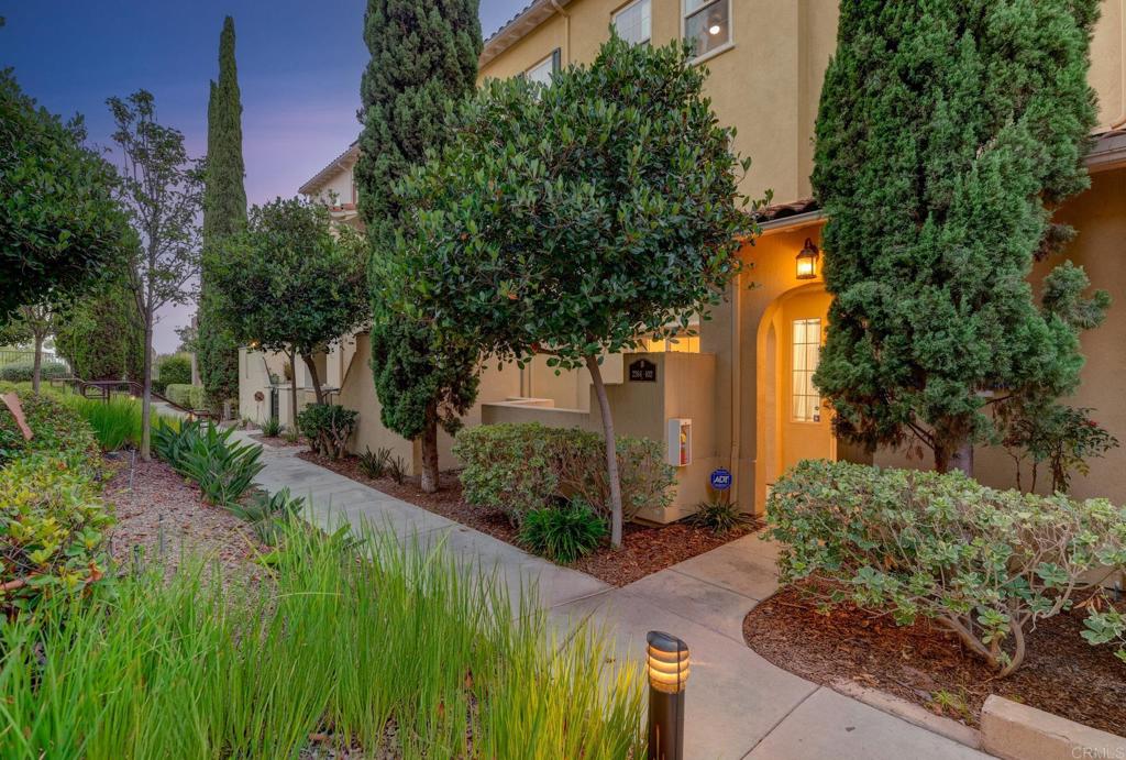 Located in the desirable Rolling Hills Ranch neighborhood, within the Otay Ranch master-planned community and just minutes from Eastlake shopping and dining, this spacious tri-level townhome-style condo offers 3 bedrooms, 2.5 bathrooms, and approximately 1,458 sq. ft. of living space with an attached two-car garage. The entry level includes a versatile bonus room that can easily serve as a third bedroom, home office, gym, or media room. On the main level, you’ll find an open-concept layout with a bright living room and cozy fireplace, dining area, half bath, and a well-appointed kitchen with a center island. Upstairs, the private level features two additional bedrooms, including the primary suite with a walk-in closet and dual-vanity bathroom, along with a conveniently located laundry closet. Enjoy modern comforts like central A/C and heating, while the HOA maintains the exterior and common areas. Community amenities include a pool, spa, playground, and BBQ areas, with nearby parks, trails, and highly rated schools in the Chula Vista Elementary and Sweetwater Union High School Districts. Easy access to freeways, Otay Ranch Town Center, and Eastlake Village makes this home an ideal choice for convenience and lifestyle.