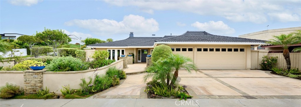 Extensively remodeled in 2019, located on a cul-de-sac street in the community of Harbor View Hills South. The single level home offers an open floor plan with wide ranging exterior spaces suited for entertaining. Plank flooring throughout, moldings, and shaker mahogany doors complement the high ceilings. LED lighting, and other details featured throughout. The main living areas flow around the open chef's kitchen, showcasing a complete Thermador Pro Solution, self-closing cabinetry, and a coffee bar. Offering three bedrooms and two- and one-half baths, the home lives large for its size due to layout of the floorplan. The LOT has features of a casual front patio, and plenty of back yard space with a Caesarstone wet bar and grilling station. This lot includes preliminary architectural plans by Don James for a 4,293 sq.ft. single-story home, complete with a courtyard and swimming pool. Minutes to the Village, Fashion Island, and award-winning schools and Newport's finest beaches.