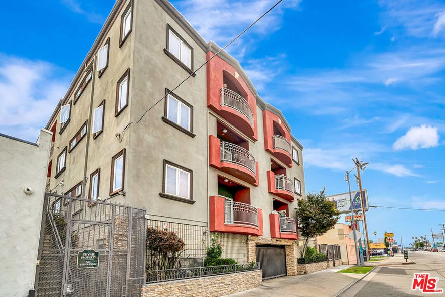 This beautifully appointed 3-bedroom, 3-bathroom condo offers approximately 1,468 square feet of thoughtfully designed living space on the third floor. The moment you step inside, you'll appreciate the soaring high ceilings and open layout that creates an immediate sense of space and light throughout the entire home.The heart of the residence features a seamless flow between the living and dining areas, anchored by elegant contemporary lighting fixtures and rich wood-look flooring that extends throughout the main living spaces. Large windows frame pleasant views while filling the interior with an abundance of natural light, and the private balcony extends your living space outdoors, offering a peaceful retreat with great views of the surrounding area. Modern conveniences include an in-unit washer and dryer setup for your convenience. The kitchens neutral color palette of soft grays and crisp whites creates a calming, sophisticated backdrop that will complement any decorating style, while the quality finishes throughout  from the smooth painted walls to the contemporary fixtures  speak to the care and attention put into this home.The third-floor location provides both privacy and elevation, offering a sense of separation from street-level activity while still maintaining easy access to your daily routines. High ceilings throughout enhance the feeling of spaciousness, making each room feel larger and more open than the square footage might suggest.Located in the dynamic North Hollywood neighborhood, you'll enjoy the perfect blend of urban convenience and residential tranquility. This condo strikes that ideal balance between modern comfort and livable elegance  a thoughtfully designed space that truly feels like home from the moment you walk through the door.
