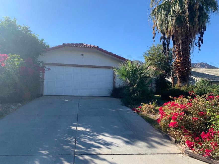 Views!! This 3 bedroom 2 bathroom home offers beautiful views and nice curb appeal. From the gated courtyard you enter into the large living area with fireplace and beautiful wood ceiling please also notice the nice separation of the bedrooms and the kitchen area. All Bedrooms are located down the hall from each other and there is a guest bathroom with a enclosed washer/dryer closet area. The primary suite offers the 2nd full bathroom. From the living room slider you enter the backyard and there is a built-in brick BBQ and a oversized spa/spool. Separate entry into the 2 car detached garage. NO HOA's and on FEE Land.