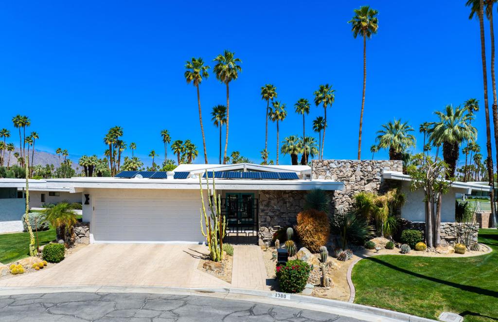This is the one you have been waiting for! FREE STANDING (no adjoining walls)! FEE LAND! (land that you own)! Modern Renovation! Mountain Views! Quiet Cul-De-Sac! Private, fenced back yard! Canyon Estates was Designed by prominent architect Charles Du Bois, who is known for his desert modernist designs, this architectural home has clerestory windows, vaulted ceilings, and geometric rooflines. The living room and dining area include a wet bar and sliders that open onto the very private patio. The living room tile is extended out onto the patio for that Palm Springs quintessential indoor/outdoor entertaining flow. This striking high end modernization includes an amazing kitchen with quartz countertops and custom tile. There is an eat kitchen area with work space and direct patio access! The primary suite has clerestory windows with views of the mountains and palm trees with three different exposures and also has direct access to the private patio. The spa-like bathroom has a stand alone tub, large shower, dual vanities and an adjacent dressing area! Bedroom 2 has views of the Canyon Estates fountain, while bedroom 3 has a separate built-in office. This very private home is filled with light and encompasses southern, western, eastern and northern views! The roof was replaced in 2024 and there is a 10.08 kW(DC) leased solar system. There is a 2 car garage with direct access into the home. This home has been featured in Modernism Events in 2 separate years. The famous MGM costume designer, Helen Rose, who was a 10 time Oscar nominee and a 2 time Oscar winner, lived in this home from 1974 to 1985. She designed wedding dresses for Elizabeth Taylor and Grace Kelley. Residents of Canyon Estates enjoy access to a range of exclusive amenities, including a 9-hole par-3 golf course, clubhouse, tennis/pickleball courts, fitness center, 15 swimming pools & 12 spas!