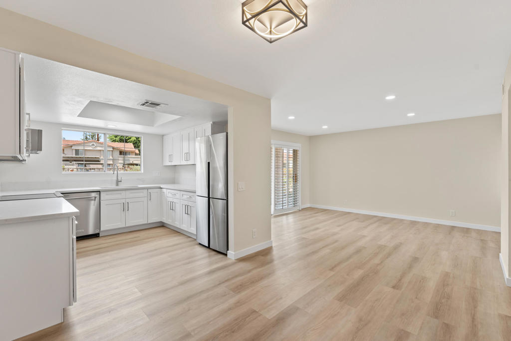 Gorgeous Remodel, unfurnished and available for 12-month or longer leases. Have the best of everything and be the first to live in this freshly remodeled Mesquite Country Club unit. First-floor unit, complete with window shutters, two patios. all new interior. Light wood look laminate flooring, freshly painted, all new bath, upgraded lighting. The Kitchen is all new with higher-end stainless steel appliances, quartz counters, new cabinetry. light, bright and cheerful you'll love coming home to this relaxing property. Upgraded HVAC system with enhanced air filtration, full-sized, washer and dryer. Outside you will have access to the gate-manicured grounds, tennis courts, pools, spas and a covered parking space. This amazing package is located minutes, from everything is South Palm Springs CA. Easy access to CV Link and downtown. Owner pays cable, trash, and water as well as HOA fee. Small dogs will be considered with pet deposit. a Call today for your private tour.
