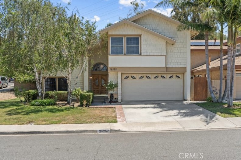 OPPORTUNITY KNOCKS in One of Laguna Hills’ Best Neighborhoods! Located in the highly desirable Aliso Place community, on the beach side of the 5 freeway and just steps from El Conejo Park, this 4-bedroom, 3-bathroom home offers incredible value and room to grow. With a great layout, a main-floor bedroom and full bath, and spacious living areas filled with natural light, this home is ready to become your forever home. Enjoy fresh paint throughout and new carpet upstairs, with the original kitchen and bathrooms giving you a chance to add your personal touch over time. The family room opens to a private and generous size backyard with a pool, spa, built-in BBQ, and plenty of space to relax or entertain. Upstairs, the large primary suite includes a bonus retreat area (perfect for an office or reading nook-permitted), an en-suite bath with separate shower, and a walk-in closet located in the bedroom. Additional highlights include No HOA, excellent corner-lot location within neighborhood, a 2-car garage, solar panels, water filtration system, and mature landscaping with beautiful fruit trees. This is a rare opportunity to live in a quiet, established neighborhood with no HOA, just minutes from top-rated schools, parks, shopping, dining, and the beach. Don't miss your chance to make this special home your own!