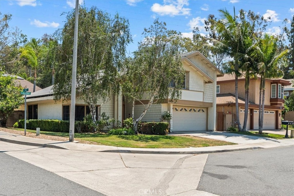 Timeless Charm in coveted Aliso Place, Laguna Hills! Located on a spacious corner lot in the highly desirable, beach-side-of-the-5 community of Aliso Place and steps away from El Conejo Park, this 4-bedroom, 3-bathroom home offers an ideal blend of comfort, space, and opportunity. Enjoy quiet streets, large lots, and no HOA in one of Laguna Hills’ most established neighborhoods. The flexible layout includes a main-floor bedroom and full bath, perfect for guests or a home office. Step into a dramatic entry with soaring ceilings, a formal living and dining room, and abundant natural light throughout. Fresh paint and new carpet upstairs make this home move-in ready, while the original kitchen and bathrooms provide a great opportunity to update over time. The family room with fireplace opens to a private backyard retreat featuring a pool, spa, built-in BBQ and plenty of space for outdoor entertaining. Upstairs, the primary suite features a generous retreat area, perfect for a home office, en-suite bath with separate shower, and a large walk-in closet. Additional features include an attached 2-car garage, solar panels, and mature landscaping. All just minutes from top-rated schools, shopping, dining, trails, and OC beaches. Don't miss your chance to own in one of Laguna Hills’ most sought-after neighborhoods. NO HOA!