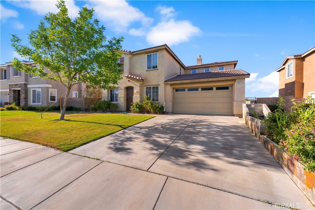 Welcome to this move-in-ready home nestled in a desirable and well-established neighborhood of West Palmdale. This spacious single-family residence offers the perfect combination of modern updates, comfort, and location — making it an ideal opportunity for families, first-time buyers, or savvy investors. Step inside and be greeted by an open and inviting floor plan with abundant natural light pouring through large windows. The spacious living room features high ceilings, a cozy fireplace, and seamless flow into the dining and kitchen areas — perfect for entertaining or enjoying quiet evenings at home. The kitchen boasts sleek countertops, ample cabinetry, and stainless steel appliances, creating a functional space that’s as stylish as it is practical. The home offers multiple generously sized bedrooms, including a private primary suite complete with an en-suite bathroom and plenty of closet space. Each room is thoughtfully laid out to maximize comfort and functionality, ideal for families of all sizes. Outside, enjoy a large backyard space with endless possibilities — whether it's creating a garden or building your dream outdoor oasis. The expansive lot provides privacy, space for kids or pets to play, and the perfect setting for summer gatherings and weekend BBQs. Located just minutes from top-rated schools, shopping centers, restaurants, and easy access to major highways, this home offers both convenience and tranquility. With great curb appeal, tasteful upgrades throughout, and a fantastic location, this is truly a standout property you won’t want to miss. Schedule your private showing today and discover the perfect place to call home!