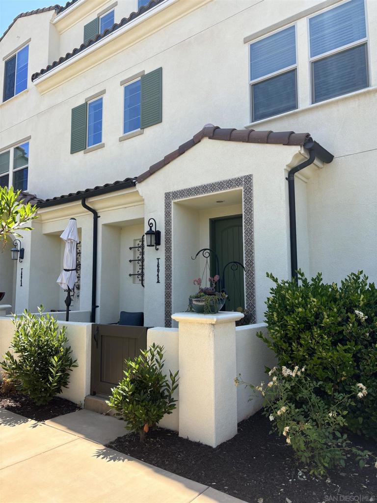 Welcome home! Beautiful light and bright townhome located in the gated Veridian community within Del Sur. This home offers a spacious open concept, laminate hardwood flooring, upgraded carpet, kitchen with granite counters, and stainless-steel appliances. Primary suite has dual vanity sinks and a walk-in closet. Ceiling fans in the living room and bedrooms with remotes. Full size stackable washer and dryer. 2-car attached garage with epoxy flooring, and EV charging. The community amenities include pool, spa, playgrounds, dog park and BBQ area. Close proximity to shops and restaurants in 4S Commons. Within the Poway School District. This townhome is a must see!