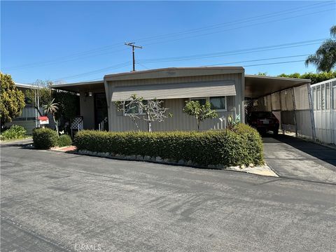 Photo of 1515 W Arrow Highway Hwy, Upland, CA 91786 (MLS # CV26056647)