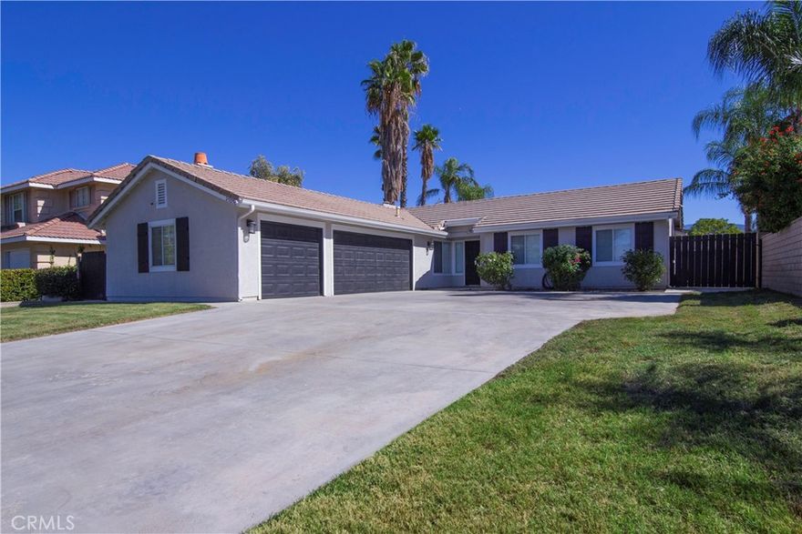 Welcome to this beautifully updated 4-bedroom, 2-bath ranch-style home located in a peaceful and picturesque Hemet neighborhood. With upgraded flooring throughout and high ceilings that create a bright and airy atmosphere, this home offers the perfect blend of comfort and style.
The updated kitchen features modern finishes and an open layout ideal for everyday living and entertaining. The spacious primary suite includes an en suite bathroom for added privacy and convenience. The oversized 700 sq. ft. three-car garage also offers ample space for vehicles, storage, or workshop use.  Theres even room for your travel trailer, toy hauler, and boat on the oversized driveway and side yard.  
Step outside to a large backyard—perfect for outdoor living, gardening, or creating your dream retreat. Located in an idyllic neighborhood with a welcoming atmosphere, this home delivers exceptional value and lifestyle and won't be for sale for long!