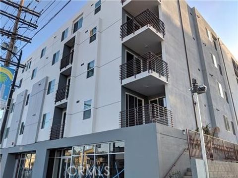 Photo of 7343 Reseda Boulevard #303, Reseda, CA 91335 (MLS # SR25162103)