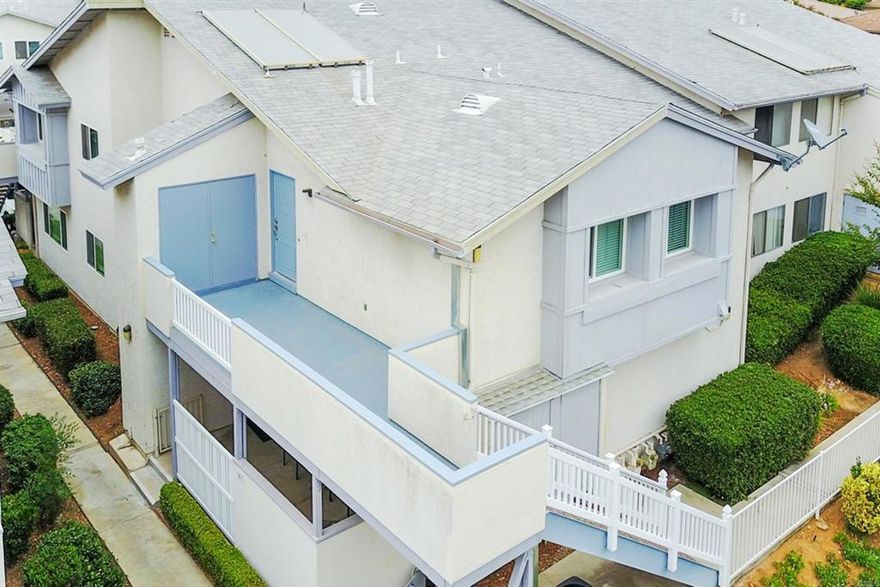 Welcome home to this beautifully updated, and perfectly styled, upper corner unit tucked away in a lovely pocket of Santee... Riderwood Square! Perfect distance to the community pool with west-facing views of the mountains and sunsets from the private and spacious balcony, this 3-bedroom, 2-bath condo has recessed lighting, wood-look flooring, in-unit laundry, a spacious living room with built in bookshelves, separate dining area, and a nice-sized primary bedroom with walk-in closet. The modern kitchen has newer cabinets, gorgeous, light-colored granite countertops and stainless steel appliances. Other bonuses are extra storage in the attic/crawl space and storage closet off the balcony, lots of visitor parking, fantastic schools, wonderful hiking trails and parks nearby plus a dedicated parking space. Pride of ownership is so evident in this lovely abode! Come see!