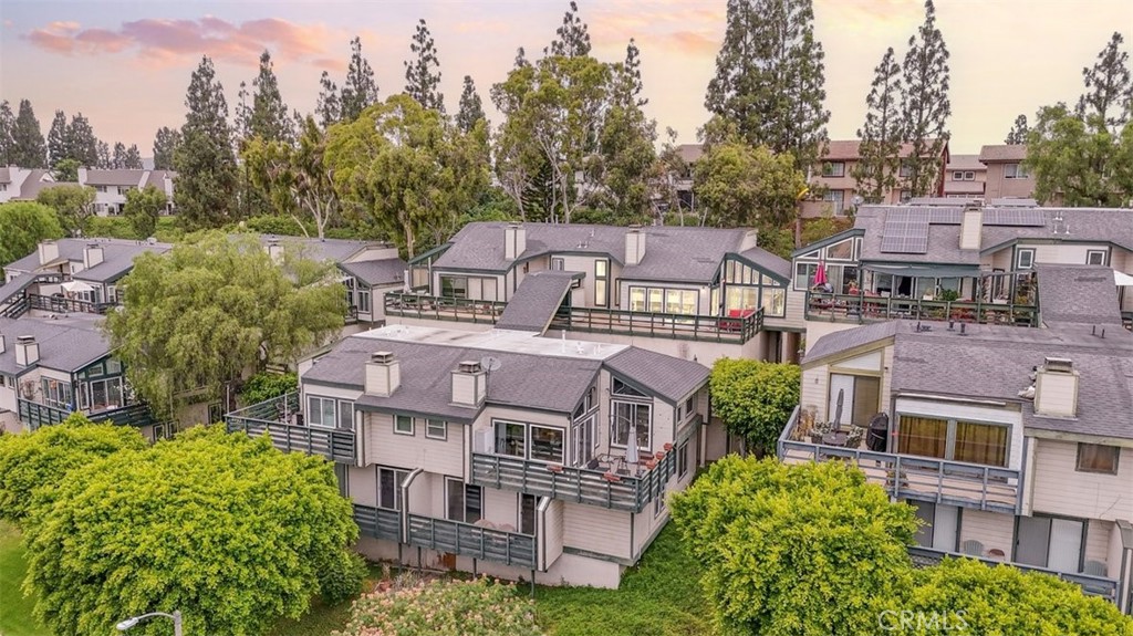 Step into your dream home in the vibrant heart of Placentia with an amazing view!
This stunning 1,242-square-foot upper-level, single-story residence blends classic charm with modern comfort—and offers breathtaking views. Perfect for first-time buyers, investors, or anyone seeking a peaceful yet well-connected lifestyle. The open-concept layout, featuring high ceilings and abundant natural light, creates a warm and welcoming atmosphere. The spacious kitchen boasts ample counter space and storage, ideal for cooking enthusiasts. The primary suite is a relaxing haven, complete with a large closet and a luxurious en-suite bathroom featuring a double vanity bathed in natural light, plus convenient indoor laundry. Enjoy sweeping city and mountain views from the expansive wrap-around balcony—perfect for morning coffee or evening gatherings. The second bedroom, with its own private balcony overlooking a lush greenbelt, offers a tranquil retreat while the second bath offers a brand new modern vanity set for your guest. A stylish fireplace anchors the great room, adding cozy charm, while large windows and sliding doors seamlessly blend indoor and outdoor living. This home includes two garage parking spaces, access to a community pool, and a prime location near top dining, shopping, golf courses, scenic trails, and iconic destinations like Disneyland, Honda Center, and Angel Stadium.