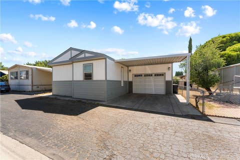 Photo of 5711 Columbia Way WAY #127, Quartz Hill, CA 93636 (MLS # SR26139177)