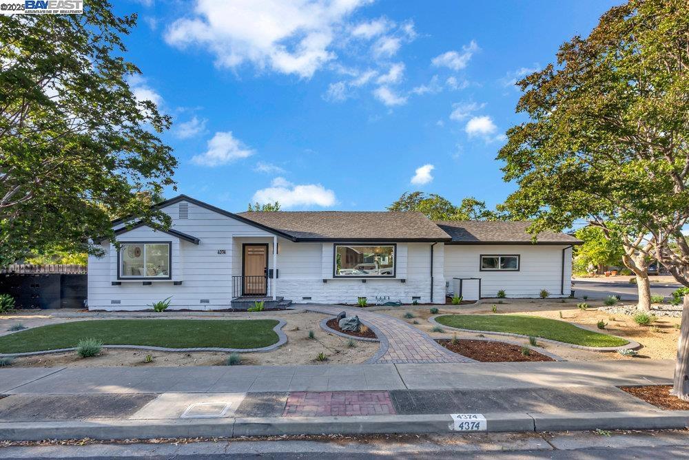This gorgeous South Livermore custom corner home was built in 1959 and fully renovated in 2025. Nestled between the wineries and Jensen tract, sits this amazing home with second unit. Main home is 1700+ square feet and features an open floor plan, chefs kitchen with Forno appliances, 4 bedrooms, 2 baths with elegant modern touches and ample storage space throughout. The second unit is 600+ square feet and features a large chefs kitchen, open floor plan, 1 bedroom, 1 bath with fireplace and its own enclosed patio. The lot is .27 acre with fruit trees, new sod, and low maintenance, drought resistant landscaping in the front. Across the street is the entrance to a large open space park with playground and numerous trails. close to downtown Livermore nightlife and wineries. A must see!
