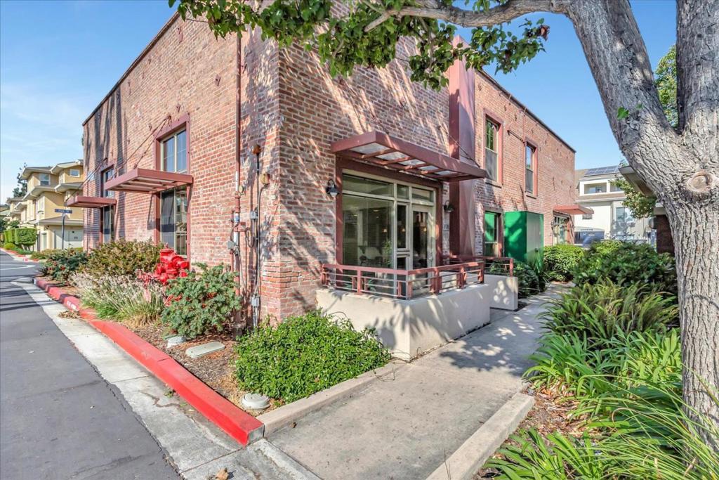 Ultimate urban living at Mariani Square in Japantown! This stunning loft was converted by Pulte Homes from the Mariani canning factory. Original brick walls, super high ceilings, concrete floors on the main level, wood upstairs, stunning kitchen with slab granite counters, breakfast bar, inside laundry, walk-in closet, A/C. Huge lawn area perfect for walking your pets! Walk to farmers market, restaurants and shops. Great commute location close to many high-tech campuses. Japantown is a highly sought after place to live and invest in.