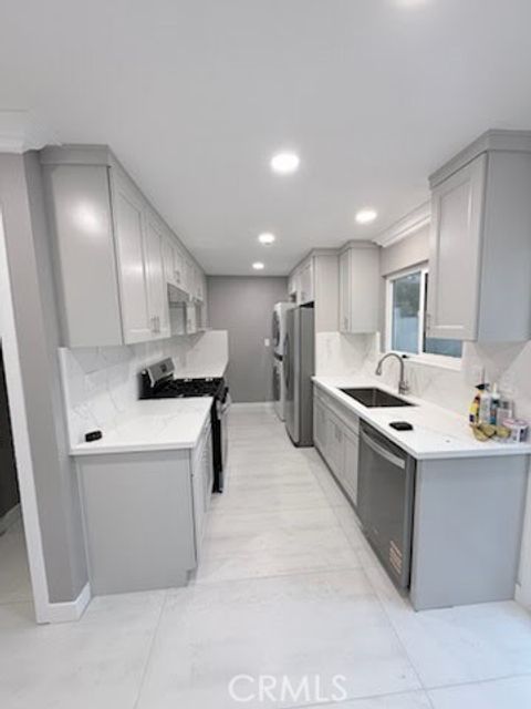 Photo of 16586 Montego Way, Tustin, CA 92780 (MLS # CV25261773)