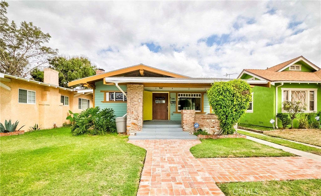 Photo of 1705 W 52nd ST, Los Angeles, CA 90062 (MLS # SB26201111)