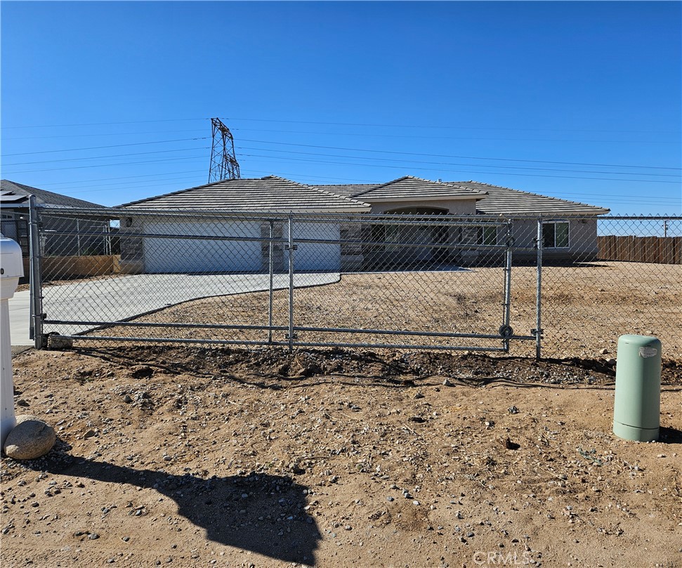 Newer home with 4 Bedrooms and 2 full bathrooms, located in a very well known area in The Mesa in Hesperia. Home is only 4 years old and it has been kept in great condition by the original owner. Home comes with a solar system which is paid in full to save in energy costs. All windows throughout the home are dual pane windows for energy efficiency. Three car garage with drywall walls finished and two doors (16' and 8"), the entire property has a chain link fence. Large modern style kitchen with kitchen island, recessed lights as well as beautiful light and plumbing fixtures. Vaulted ceilings in living Room, Ceiling fans in all four bedrooms. Tank-less water heater, Large Covered patio attached to the back of the house, Formal dining area as well as a nice size breakfast nook. Modern style fireplace in the living room, Indoor Laundry with washer and dryer hookups and storage cabinets. Bathrooms, Laundry, hallway, dining and living room floors are all finished with ceramic tile while all the bedrooms have carpeted floors. This home seems to be in like New condition, however buyer(s) must verify / inspect all aspects of the property within the due diligence period . Property is being sold As-Is. Seller's choice of all services including, but not limited to NHD, Title, Escrow, etc; Check virtual tour attached .