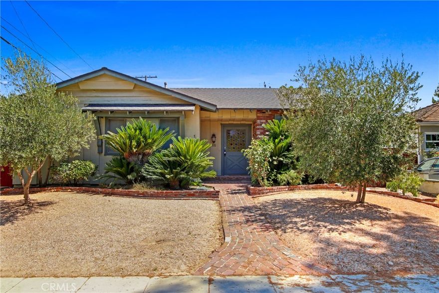With over 2,000 square feet, and an unbeatable Burbank location, this amazing home is the one you have been waiting for!  As you walk in the warm and inviting entry way you find a great open floor plan that is the perfect balance of function and flow, 3 spacious bedrooms, 2 full bathrooms, 2 large living rooms, a gorgeous kitchen with an abundance of gorgeous cabinetry, granite counters, and stainless steel appliances, a large dining room area that can also serve as additional living space if you would like, a brick fireplace, an interior laundry room complete with washer and dryer, and an attached 2 car garage with direct access to and from the home.  In addition, the home features hard wood floors, smooth ceilings (no popcorn), recessed lighting, and an abundance of windows and sliding doors, which bring in tons of natural light and cool breezes, while seamlessly transitioning the interior of the home to the gorgeous exterior of the home for that So Cal indoor-outdoor living.  Thie outside of the home is just as impressive as the inside.  The front of the home features gorgeous mature landscaping, and an inviting brick walkway that leads up to the home's entrance.  The expansive back yard features a large covered patio where you can create an ideal outdoor living space to enjoy the gorgeous so cal weather, as well as a large swimming pool, a jacuzzi, and plenty of room for all of your outdoor needs.  In terms of location, it doesn't get any better than this.  The home is centrally located near shopping, dining, entertainment, horse stables, major transit, tv/movie studio lots, and so much more!  This is the home for you!