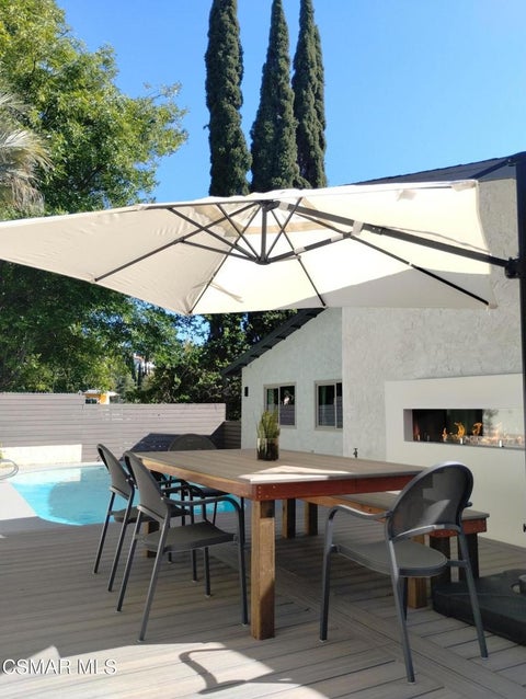 Photo of 21794 Ybarra Road, Woodland Hills, CA 91364 (MLS # 226004088)