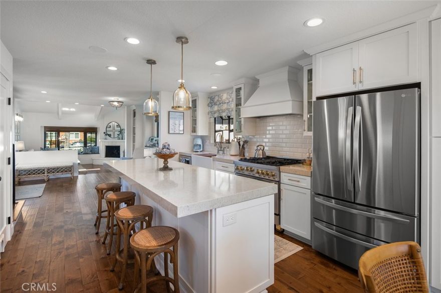 Location Location Location Centrally located in the heart of Downtown, Huntington Beach. Walk or Bike to The Beach, The Huntington Pier, Pacific City, or Main Street. A home this clean and completely remodeled “To this magnitude” is a RARE opportunity. Only the highest quality materials. Open floor plan. Light and Bright! An entertainers dream. Detailed custom design throughout. A sprawling kitchen with neutral tones welcomes you from the living room, dining area, and the outdoor private courtyard. An office nook off the kitchen offers convenience with easy accessibly. The outdoor space makes for a peaceful lounge area showcasing a large wall mounted outdoor TV and a coastal dream swing. Upstairs offers 2 well sized rooms, one with a large balcony, in addition to the Master suite on the west wing. The Master features a cozy fireplace, large closet, and a beautiful washroom lined with wainscoting and has a skylight. Beach wood planked flooring throughout – No Carpet. Park with ease. 2 car garage plus 1 horizontally parked car in the driveway. No parking meters in front of the property. This is truly a home to see in-person to appreciate every corner perfectly planned into fruition.
