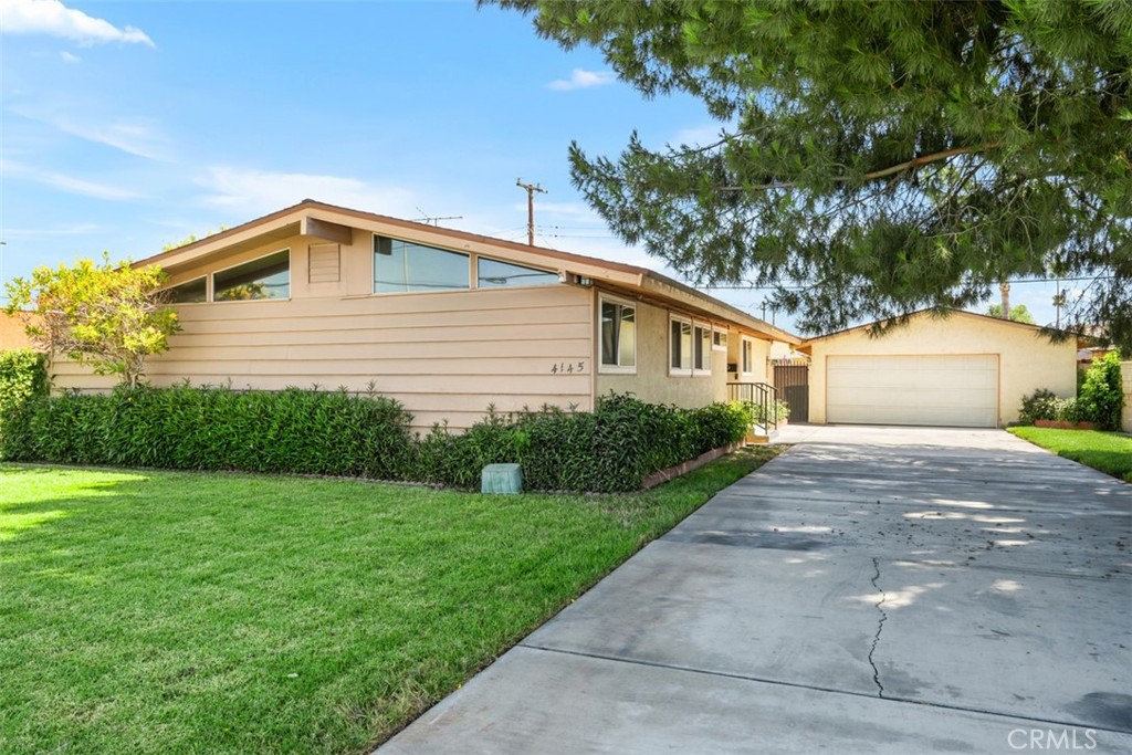 Unlock the potential of this classic 1955 single-story ranch home, ideally situated in the heart of Riverside's desirable Ramona neighborhood. With 4 bedrooms, 2 bathrooms, and approximately 1,296 square feet of living space on a generous 6,098 square foot lot, this property offers a fantastic opportunity for investors, flippers, or buyers ready to roll up their sleeves and create their dream home. Inside, you’ll find a functional layout highlighted by a cozy living room fireplace, central heating and air and spacious bedrooms—all awaiting your personal touch. The detached two-car garage, connected to the home via a breezeway, provides ample parking and possible RV access. The large backyard boasts mature trees creating a private retreat with endless potential. Located near Jackson Elementary, Chemawa Middle, and Arlington High School, this property is within minutes of shopping, dining, and freeway access. Whether you’re looking to restore and flip or build long-term equity as an owner-occupant, 4145 Jackson St is a true diamond in the rough. Bring your contractor and vision—this is the fixer-upper you've been waiting for!