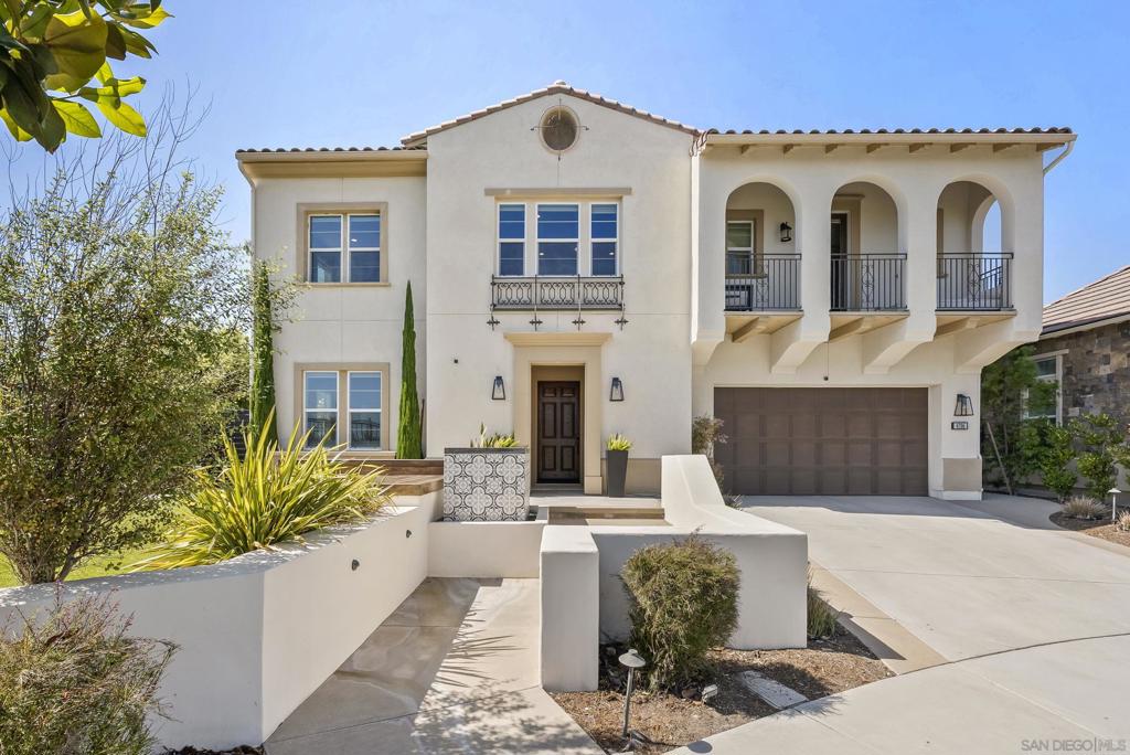 Discover this stunning Toll Brothers Masterpiece, nestled in the exclusive, gated community of The Terraces in Robertson Ranch. This luxurious residence, situated at the end of a tranquil cul-de-sac, offers canyon views and unparalleled privacy. With over 4400 sq. ft. of living space, 5 bedrooms & 5 ½ baths, this home is not to be missed. Step inside to an expansive open floor plan, where soaring ceilings & abundant natural light create an inviting & airy atmosphere. The home boasts stunning hardwood floors throughout. The kitchen is a chef’s dream, featuring a sprawling island, built-in refrigerator, dual ovens & tons of cabinetry. Seamlessly flowing into the family room with a fireplace, this space is perfect for both entertaining & everyday living. On the main floor, you'll find a guest bedroom with an ensuite bathroom plus a moody vibe lounge/office with a modern accent wall. The courtyard provides a serene spot for casual outdoor gatherings with a fireplace & gorgeous water feature covered by an exquisite wood covering that opens & closes. Upstairs, a large bonus room complements four additional bedrooms, each with an ensuite bathroom. The luxurious primary suite offers a beautiful bathroom with dual vanities, a makeup vanity, a soaking tub, and a spacious walk-in closet. The backyard is an entertainer’s delight! It features a firepit area with built in seating, a large water feature, a relaxing spa, and a built in BBQ island and plenty of room for a dining table. Ideal for relaxation and entertaining. Community features a resort style pool, rec.center & hiking trails Discover this stunning Toll Brothers Masterpiece, nestled in the exclusive, gated community of The Terraces in Robertson Ranch. This luxurious residence, situated at the end of a tranquil cul-de-sac, offers breathtaking canyon views and unparalleled privacy. With over 4400 sq. ft. of living space & 5 bedrooms & 5 ½ baths, this home is not to be missed. Step inside to an expansive open floor plan, where soaring ceilings & abundant natural light create an inviting & airy atmosphere. The home boasts stunning hardwood floors throughout. The kitchen is a chef’s dream, featuring a sprawling island, built-in refrigerator, dual ovens & tons of storage cabinetry. Seamlessly flowing into the family room with a fireplace, this space is perfect for both entertaining & everyday living. On the main floor, you'll find a guest bedroom with an ensuite bathroom plus a moody vibe lounge/office with a modern accent wall. The courtyard provides a serene spot for casual outdoor gatherings with a fireplace & gorgeous water feature covered by an exquisite wood covering that opens & closes. Upstairs, a large bonus room complements four additional bedrooms, each with an ensuite bathroom. The luxurious primary suite offers a beautiful bathroom with dual vanities, a makeup vanity, a soaking tub, and a spacious walk-in closet. The backyard is an entertainer’s delight! It features a firepit area with built in seating, a large water feature, a relaxing spa, and a built in BBQ island and plenty of room for a dining table. Ideal for relaxation and entertaining. Additional highlights include surround sound, zoned A/C, and a 2 car garage. Experience the epitome of resort style living with gorgeous community pool and rec. center and gorgeous hiking trails.
