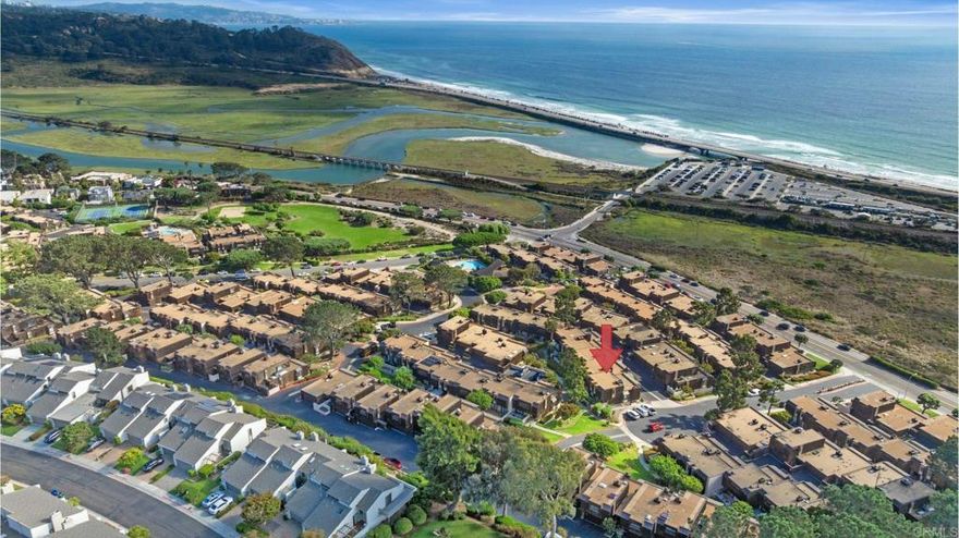 Steps from Torrey Pines State Beach with panoramic ocean views, this extensively renovated Sea Point townhome delivers the best of coastal living. Surfing, trails, dining, and Del Mar Village are all just minutes from your door. Inside, a fully redesigned layout pairs open living spaces with high-end finishes throughout. The chef’s kitchen features built-in Miele appliances and custom cabinetry. Each bathroom is outfitted with premium fixtures by Duravit and Grohe, imported from Germany for a level of quality rarely found. Heated floors run through all bathrooms and the entire lower level for year-round comfort. The top floor serves as a private retreat with a spa-style jetted tub and a seamless ocean-view suite. From the elevated tub, you can unwind with a glass of wine or champagne while watching the sun set over the Pacific. Two flexible bonus rooms provide options for an office, gym, or guest space. Additional upgrades include a reinforced structural beam, UV-protective dual-pane windows, Meshtec security screens, and a rare extended driveway. Sea Point residents enjoy resort-style amenities including two pools and spas, lighted tennis courts, a four-acre private park with walking trails and play areas, a clubhouse, and on-site management.